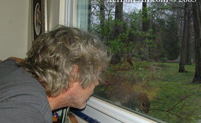 John at bedroom window