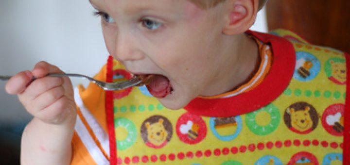 Silas loving the chocolate cake made for Petra