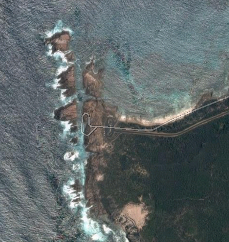 A view from Google Satellite shows why Canal Rocks is so aptly named. The rocks form a canal like water way by the beach.