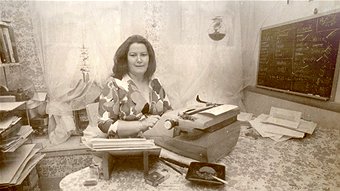 Colleen McCullough, at the typewriter.