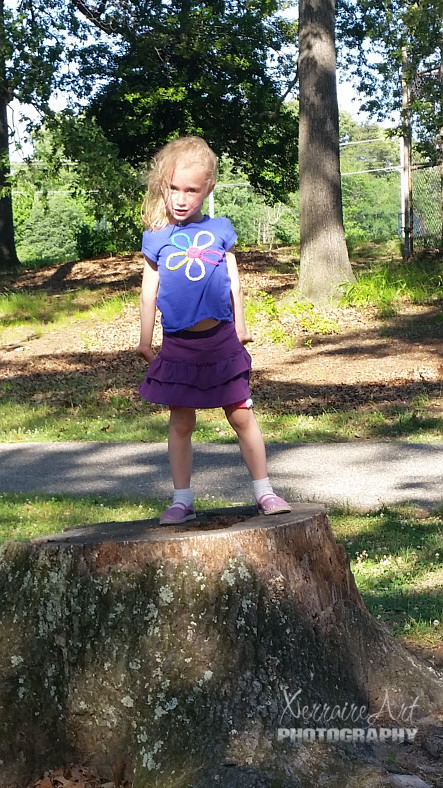 Not sure what was on Rubi's mind when she perched on top of this stump.
