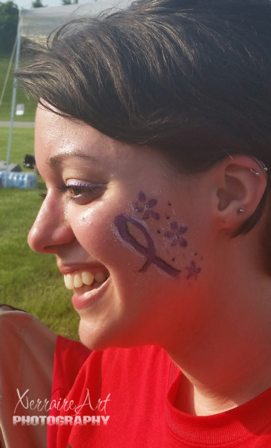 Laura got her face painted, and I was like, "It's OK Mom, it's not a Tattoo!"