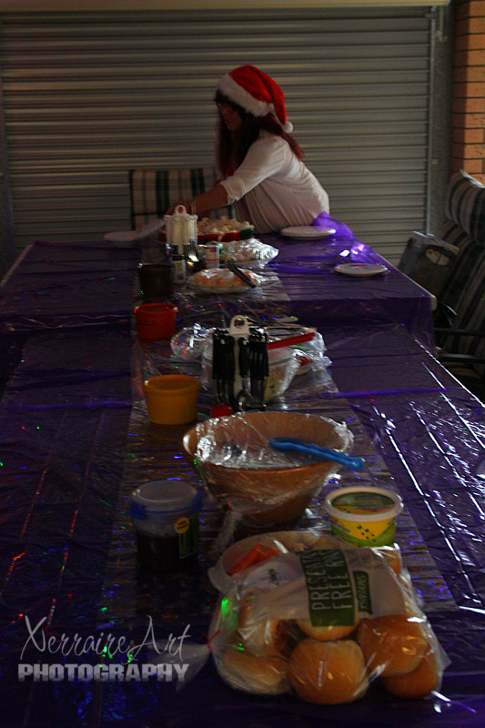 Our gracious host sets out the dinner.