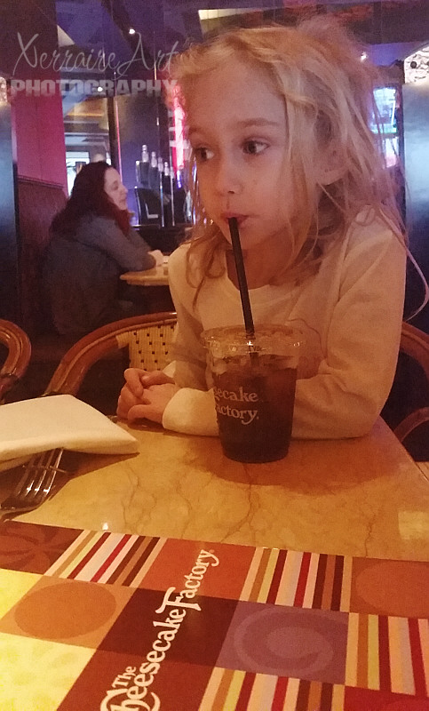 Mmmm...it's not often they get soda to drink. I liked that the waiter wisely brought water in a kid's cup when they finished their soda.