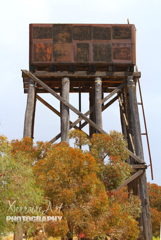 View of the preserved former water tower at the site of the former narrow gauge railway station.