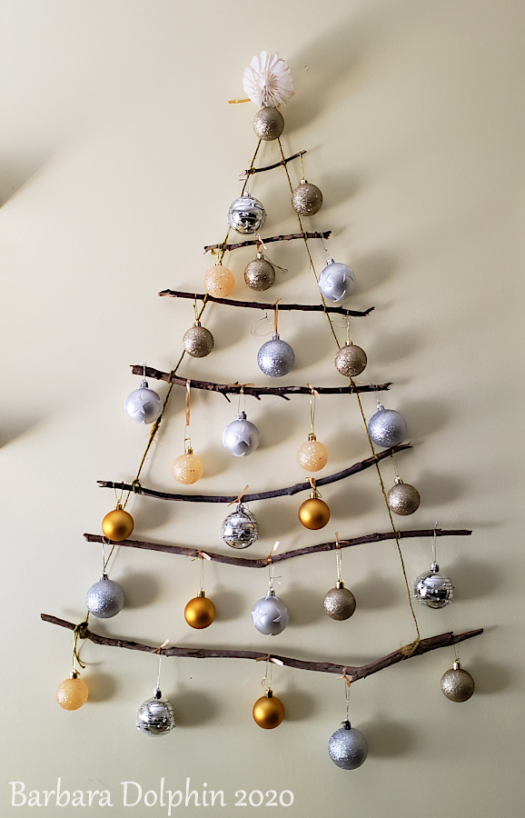 pieces of wood, some twine, Christmas tree