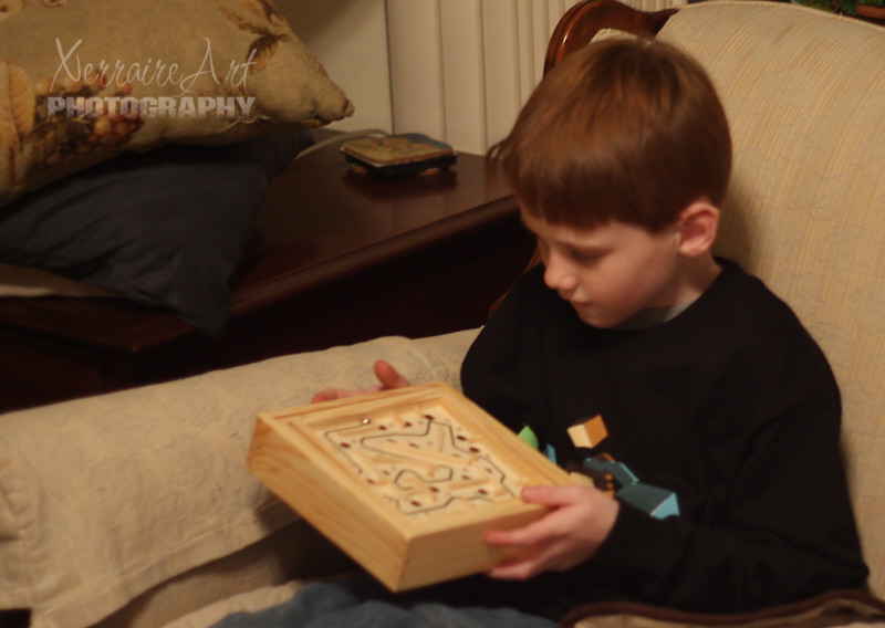 I was happy that Aiden liked the labyrinth game we got him.