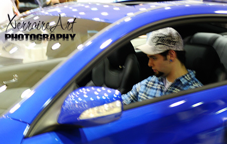 Miquel in a Genesis Coupe