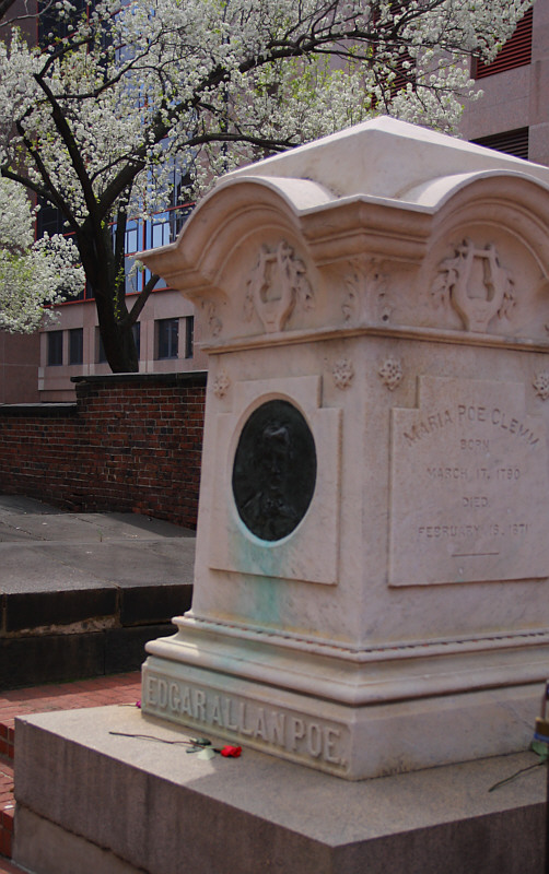 A more suitable memorial stone for Mr. Poe, at a more prominent location, later sited at the northwest entrance gate which was done and the body exhumed, moved to the new site and re-interred with public and elaborate ceremonies in 1875.