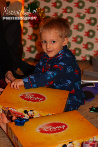eve3 Silas opening lots of goodies from the Disney Store!