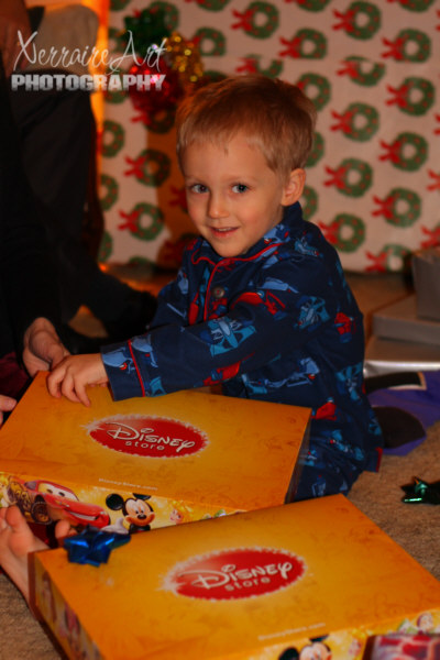 Silas opening lots of goodies from the Disney Store!