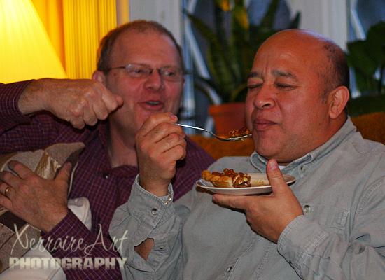 He shows Alex how to enjoy the pecan pie while Alex's wife isn't looking.
