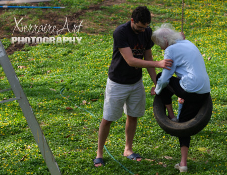 Enric helps yaya on the swing