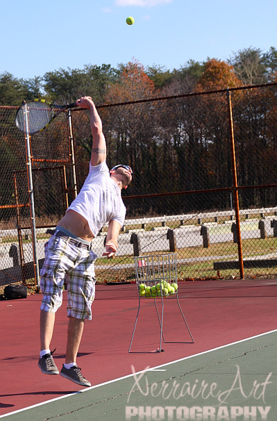 tennis11 At the end, Miquel demonstrates the serve.