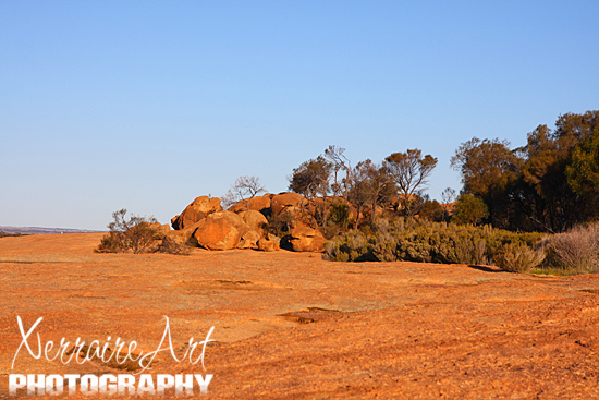 More rocks on top of the big rock.