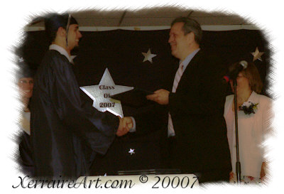 Miquel getting his diploma