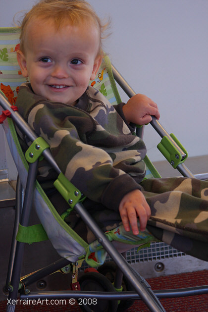 Cameron in the stroller going to DC in the metro