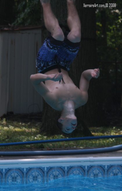 backwards dive into the pool