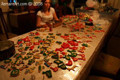 a lot of decorated cookies