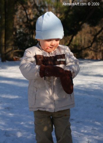 Cameron taking off his gloves, tongue out, so cute!
