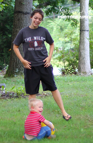 Laura playing soccer with Silas