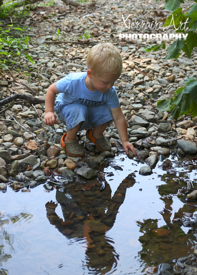 Silas by a puddle